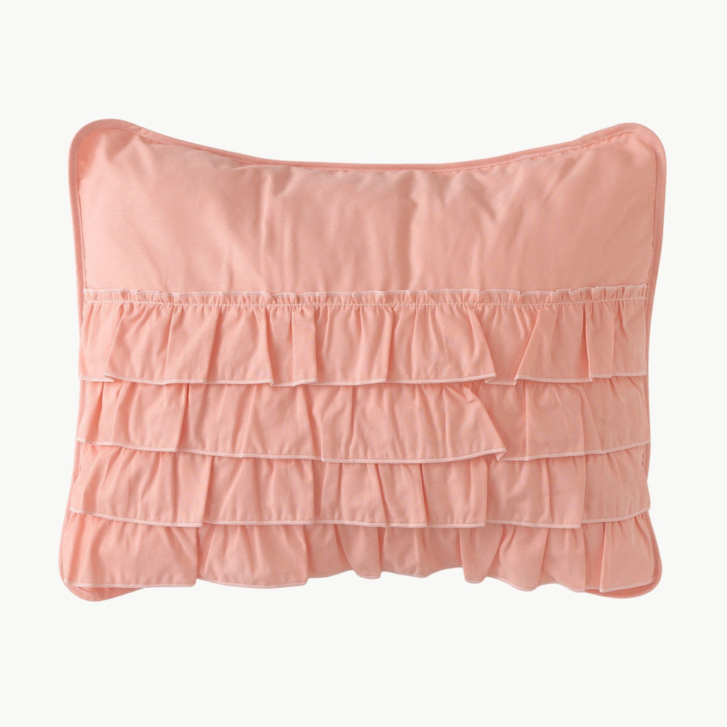 Pastel pembe fırfırlı kare süs yastığı çocuk odası dekorasyonu.