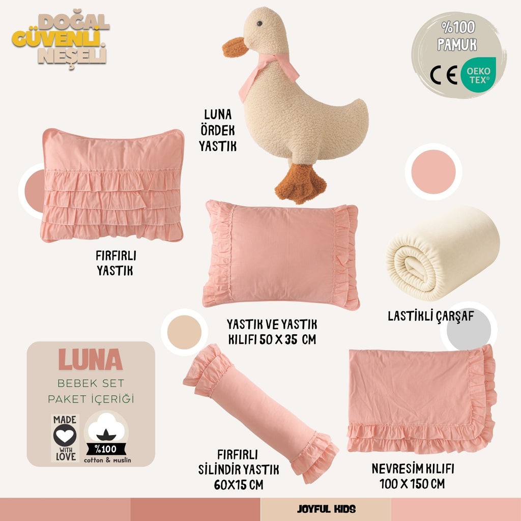 Pembe tonlarında tasarlanmış 7 parça tam bebek uyku seti ürün içeriği.